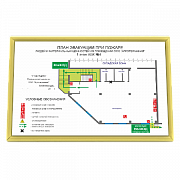 План эвакуации в золотой алюминиевой рамке